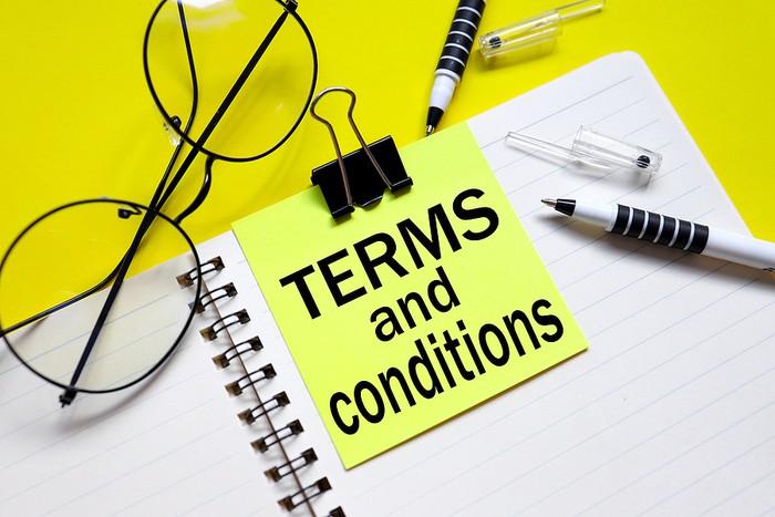 Terms and Conditions Clipped on Notepad