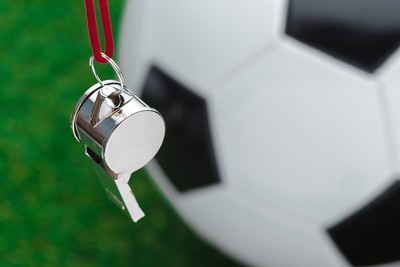 Whistle Against Blurred Football