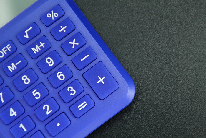 Blue Calculator on Black Background