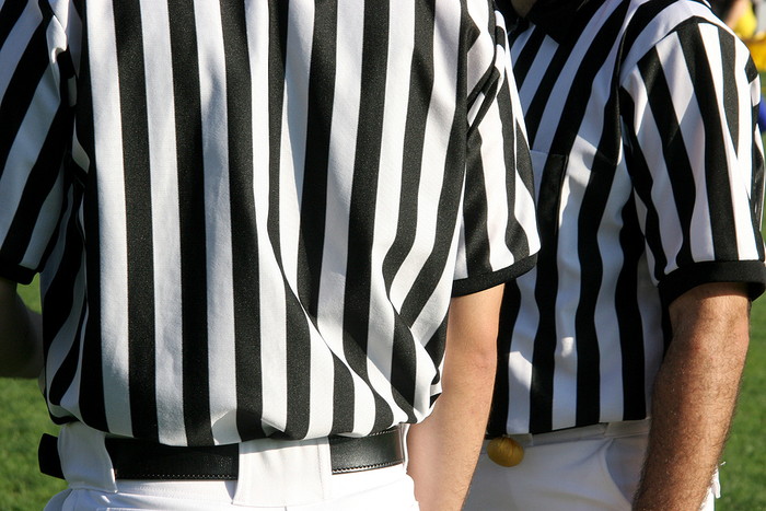 American Football Referees In Discussion