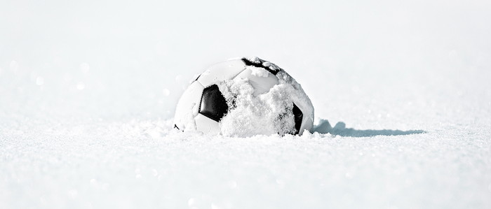 Football in Deep Snow