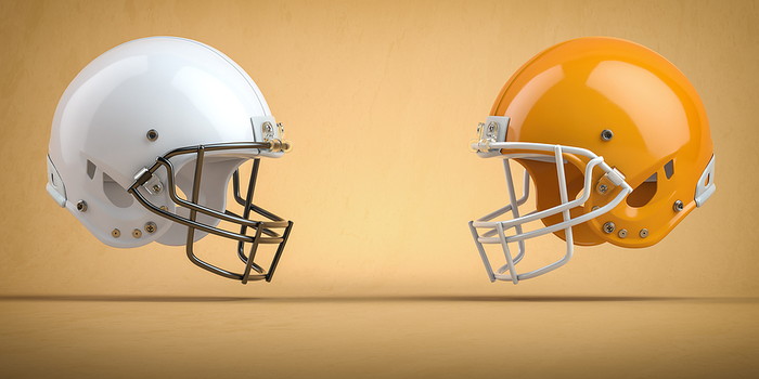 White and Yellow American Football Helmets