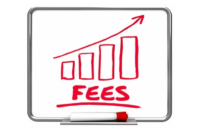 Increasing Fees in Red on Whiteboard